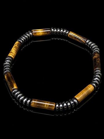 Prachtige en subtiele armband van hematiet en tijgeroog van
