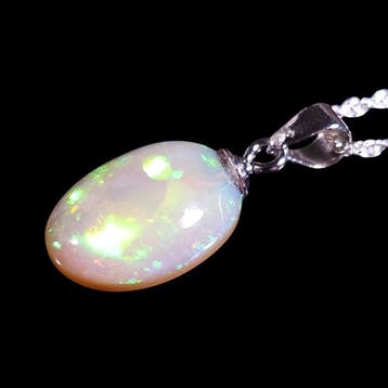 Geen reserve – 4,3 ct helder groen Flash Ethiopische opaal