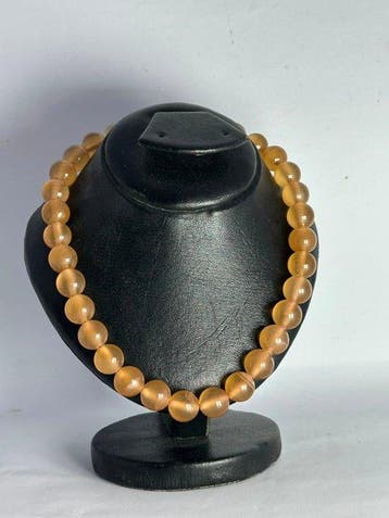 Collier en calcite miel polie Poli - Hauteur : 12 mm- 60 g -