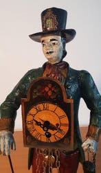 Horloge de table en forme de colporteur - En alliage -, Antiquités & Art