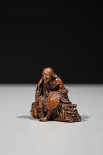 Een ongebruikelijke en fijne netsuke van buxushout van Ono