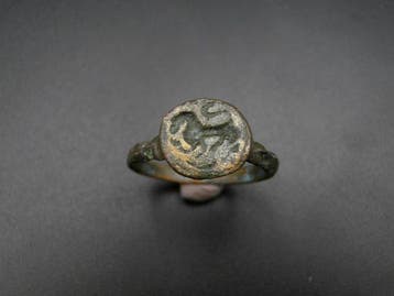 Viking period: beautiful bronze Viking ring with a dragon