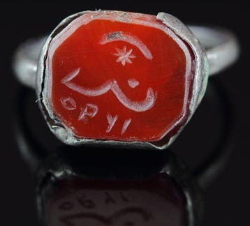 Replica van een islamitische zilveren zegelring Brons