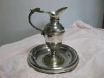 Liturgisch set met kom en kruik. (2) - Ottone argentato -