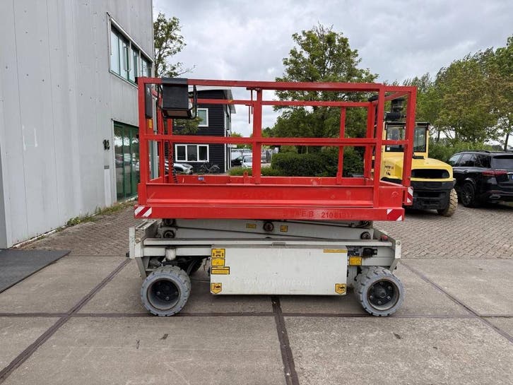 Veiling: Schaarhoogwerker Holland Lift HL84-E14 Elektrisch 8, Articles professionnels, Machines & Construction | Ascenseurs, Échafaudages & Échelles