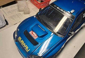 IXO 1:8 - Model raceauto - Subaru Impreza STI, Solberg/Mills, Nieuw