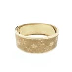 Vintage gouden slavenarmband met gravures., Ophalen of Verzenden, Gebruikt, Overige kleuren, Goud