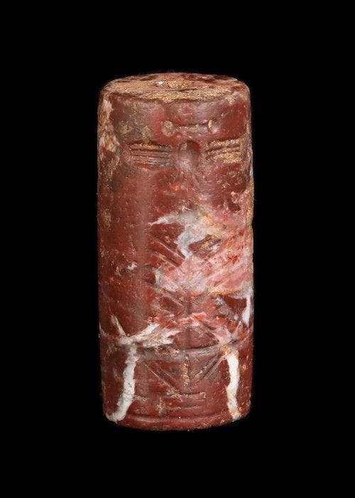 Neo-Assyrisch Red Hardstone Cilinderzegel met religieuze, Antiek en Kunst, Antiek | Overige Antiek