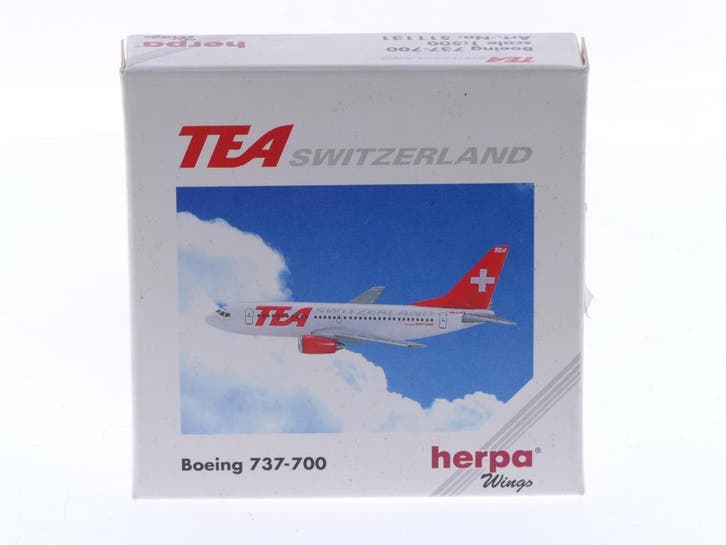 Schaal 1:500 Herpa 511131 TEA switzerland Boeing 737-700..., Hobby en Vrije tijd, Modelbouw | Vliegtuigen en Helikopters, Zo goed als nieuw