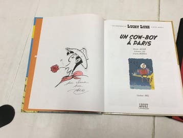 Lucky Luke - Un cow-boy à Paris + Portfolio Album + dédicace, Boeken, Stripverhalen, Nieuw