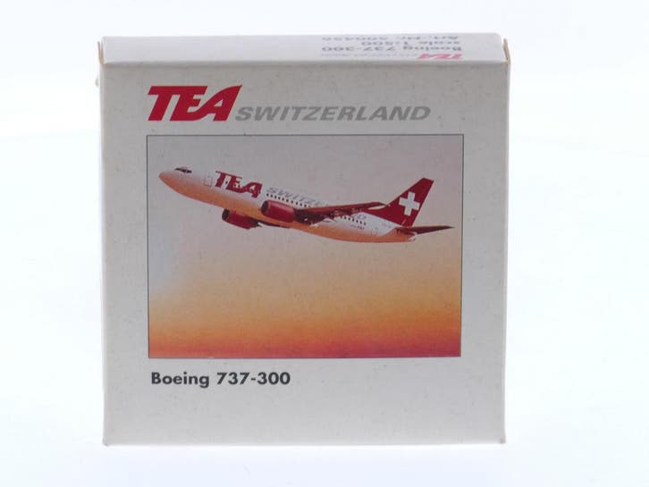 Schaal 1:500 Herpa 500456 TEA switzerland Boeing 737-300..., Hobby en Vrije tijd, Modelbouw | Vliegtuigen en Helikopters, Zo goed als nieuw