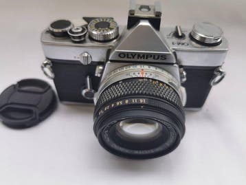 Olympus OM-1 chrome + F.Zuiko 1,8/50mm CLA´d by Expert, Audio, Tv en Foto, Fotocamera's Analoog, Nieuw