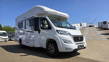 Benimar Tessoro 483 slechts 2776 km en hefbed 90037, Caravanes & Camping, Camping-cars, Half-integraal