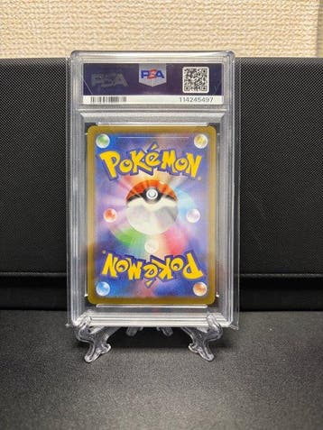 Pokémon - 1 Graded card - Team Rockets Weezing 105/098, Nieuw