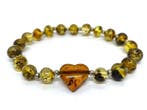Captured Pulse • mosgroene baltische barnsteen kralenarmband