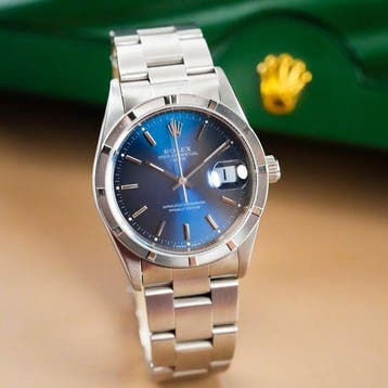 Rolex - Oyster Perpetual Date Engine Turned Bezel - 15210 -