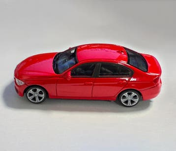 Schaalmodel BMW 335i (schaal 1:43, ca. 10x4x3 cm, rood), Verzenden, Nieuw