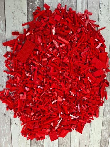 Lego Briques - Partij lego in de kleuren rood en blauw.