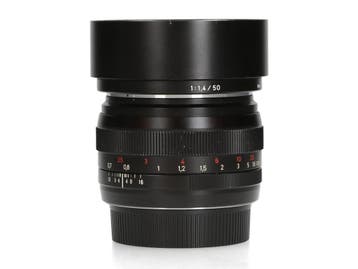 Zeiss Planar 50mm f/1.4 T* ZE - Canon EF - 1 jaar garantie, Ophalen of Verzenden, Comme neuf