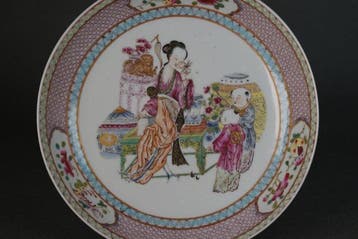 Ruby Back Plate - Bord - Lady seated on Table with Books