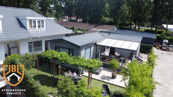 LUXE L-CHALET TE KOOP OP CHALETPARK DE WATERVAL PERCEEL 40