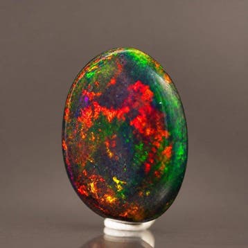 Prachtig kostbaar zwart opaal • 1,40 ct • Ongelooflijk, Verzamelen