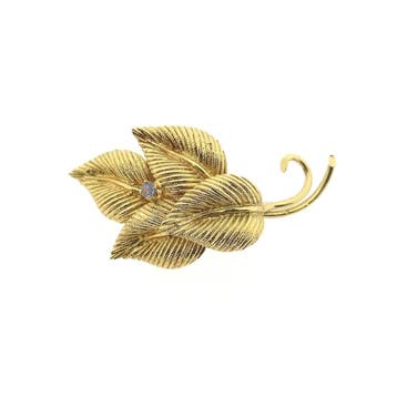Gouden broche van bladeren met saffier, Handtassen en Accessoires, Broches, Gebruikt, Ophalen of Verzenden, Met edelsteen, Goud