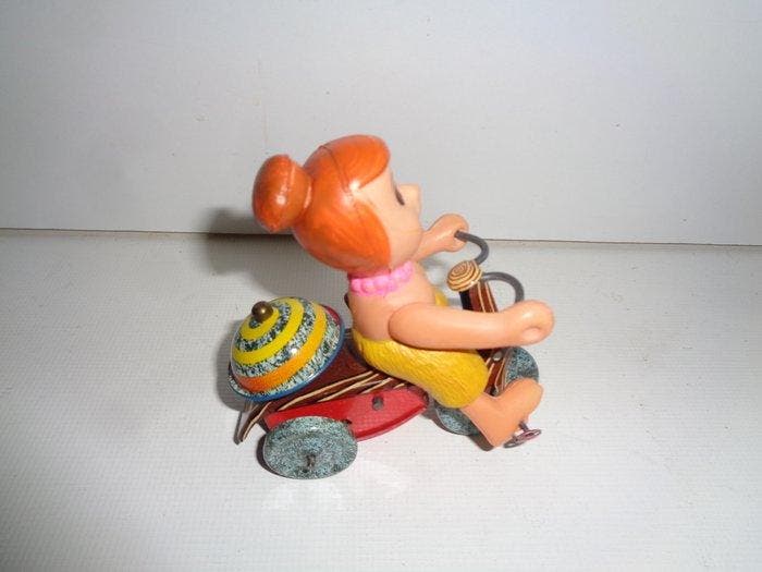 Marx - Wilmar uit The Flintstones op driewieler met bel,, Antiquités & Art, Antiquités | Jouets