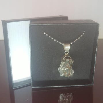 PENDENTIF MÉTÉORITE CAMPO DEL CIELO. Monture en argent. -