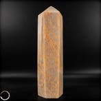 Majestueus perzik-maansteen obelisk – een symbool van kracht