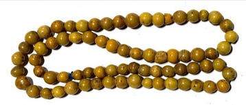 Perles du XIXe siècle sur une corde, objet de commerce