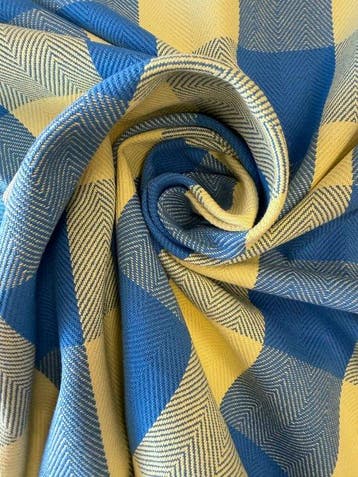 Stof met elegante visgraatbinding en een tweekleurig