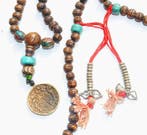 Mala bouddhiste de prière composée de 108 yeux de Bouddha,