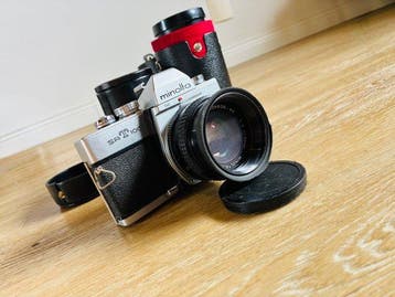 Minolta SR T 100 + Rokkor 1,7/50mm + Panagor 2,5/28mm +, Nieuw