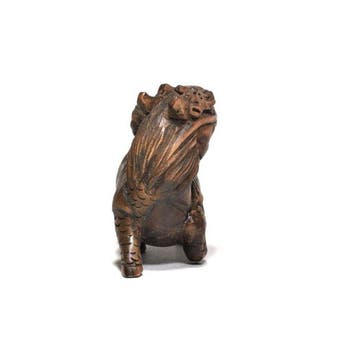 Netsuke/Okimono van een Kirin (Qilin) - Buxushout - Japan -