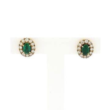 Gouden oorstekers met smaragd en diamanten; 0,48 ct., Ophalen of Verzenden