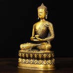A rare brass statue of Seated Shakyamuni Buddha, from a