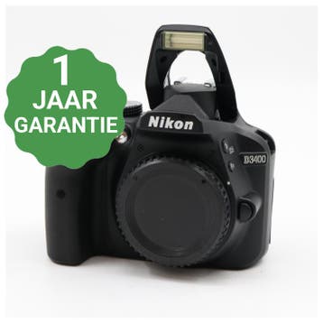 10% korting | Nikon D3400 body | Tweedehands, Verzenden