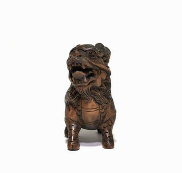 Netsuke/Okimono van een Kirin (Qilin) - Buxushout - Japan -