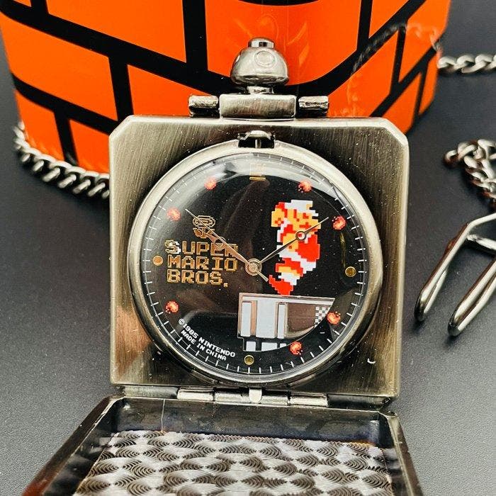 Nintendo - Super Mario Bros Fire Mario Edition Pocket Clock, Games en Spelcomputers, Spelcomputers | Overige Accessoires
