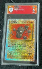 Pokémon - 1 Graded card - Geodude 77/110 Foil, Reverse holo, Nieuw