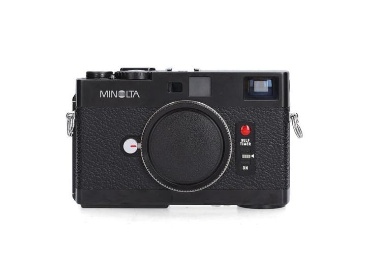 Minolta CLE - 1 jaar garantie, Audio, Tv en Foto, Fotocamera's Digitaal, Zo goed als nieuw, Minolta, Ophalen of Verzenden