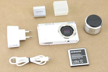 Samsung NX mini + 9-27mm lens + flitser Digitale camera
