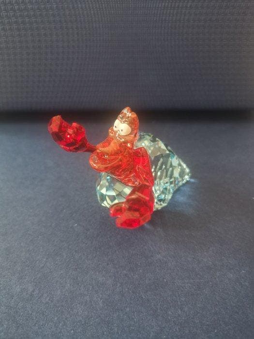 Swarovski - Figurine - Sebastian mit Box 5552918 Disney, Antiek en Kunst, Curiosa en Brocante