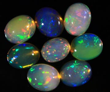 Ct. 15.0 Natuurlijke Ethiopische Opalen Cabochon - Hoogte: