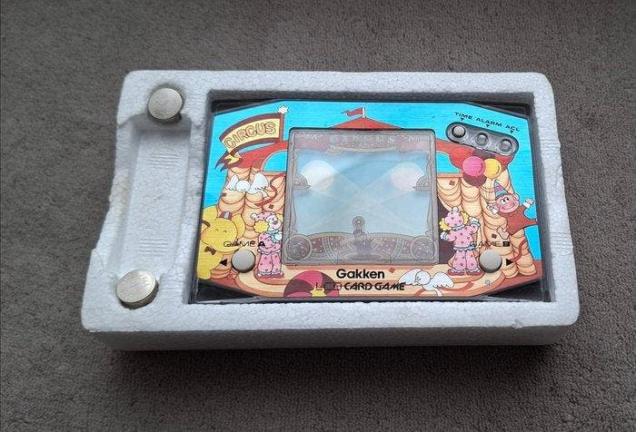 Gakken - LCD Card Game - Circus - Handheld gaming console -, Games en Spelcomputers, Spelcomputers | Overige Accessoires