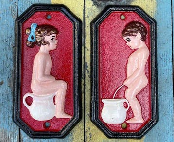 Decoratief ornament (2) - Set van twee gietijzeren