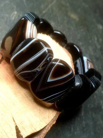 Zwarte bandagaat - Kralenarmband