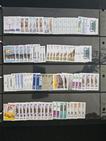 Belgique - Importante partie de timbres à affranchir rangés