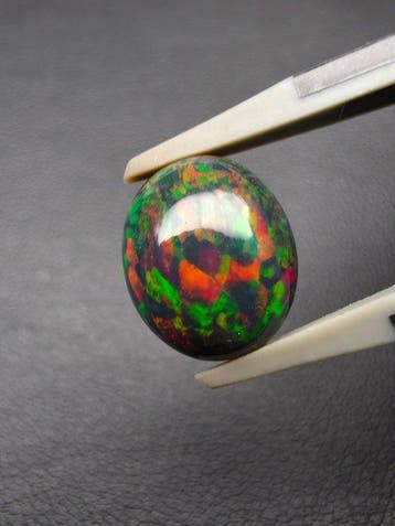 2.62cts Zwarte Opaal Cabochon- 0.52 g
